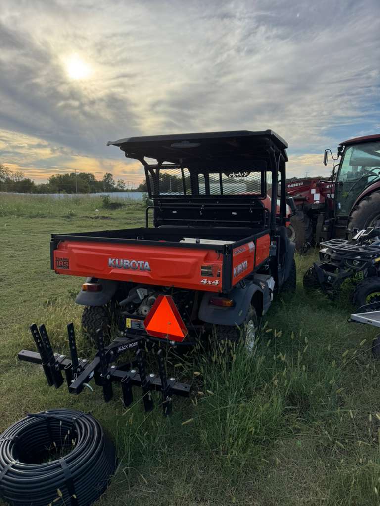 Tractor under sunset